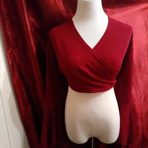 A red long ruffle sleeve crop top. NWT